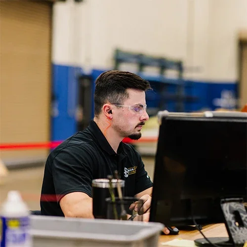 photo of operations KLP participant sitting at desk